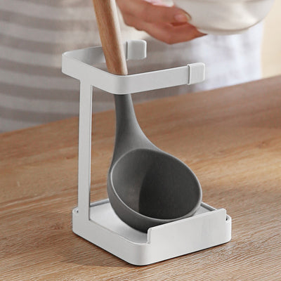 A stand for holding the lid of a pot